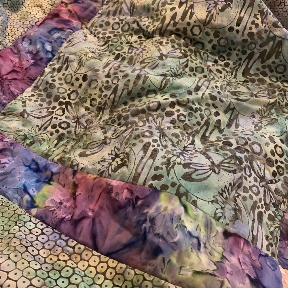 Beautifully hand stitched keepsake lap quilt
